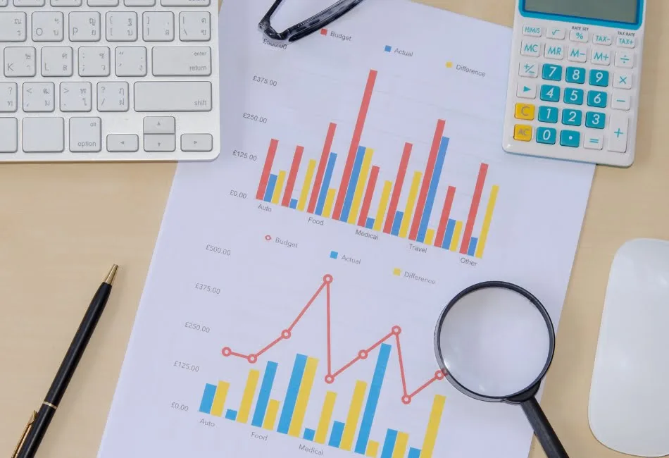 is in a desk a prepare with a graphic and a calculator